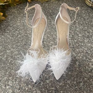 Brand new Jessica Simpson white Wolistie satin shoes 4 inch heel.